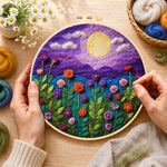 Creating the blooming flowers under the purple night moon wool painting by hand with a felting needle
