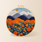 Blooming orange roses and mountains needle felting kit for beginners with a round wooden frame