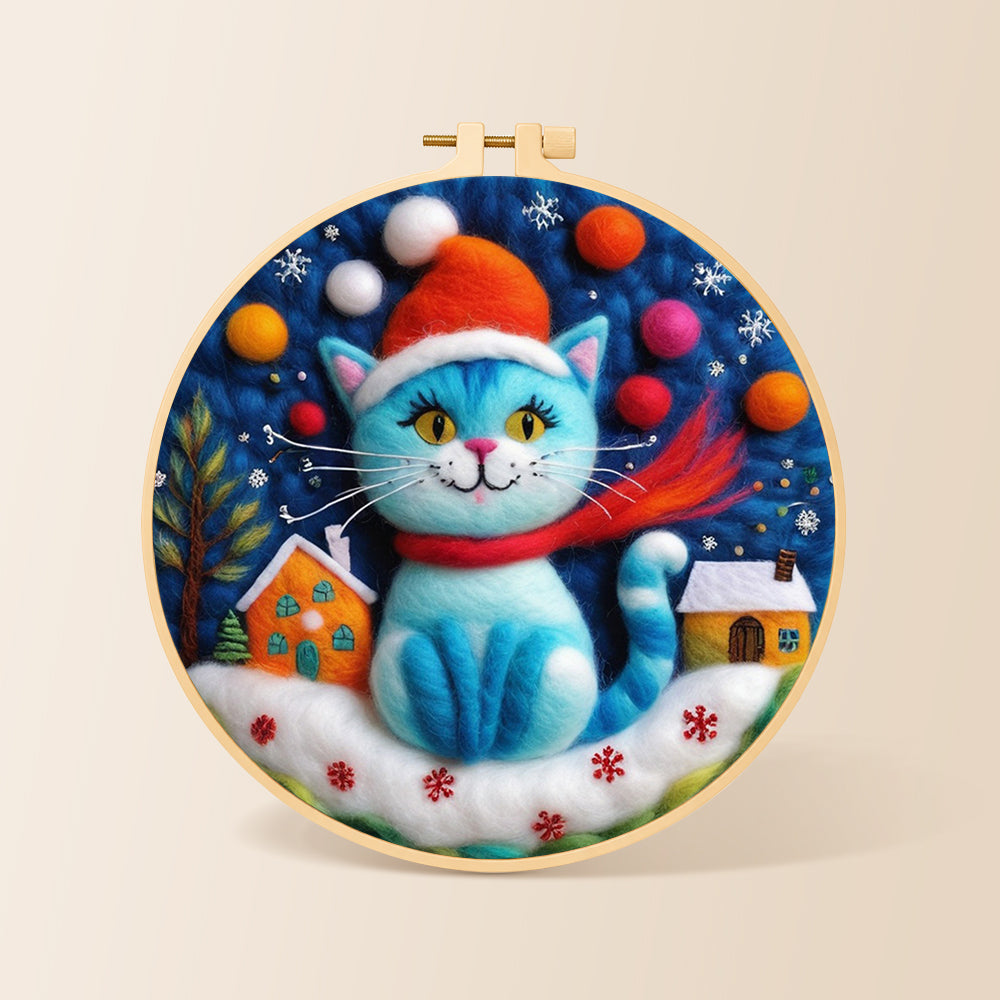 Blue christmas cat with houses needle felting kit for beginners with a round wooden frame