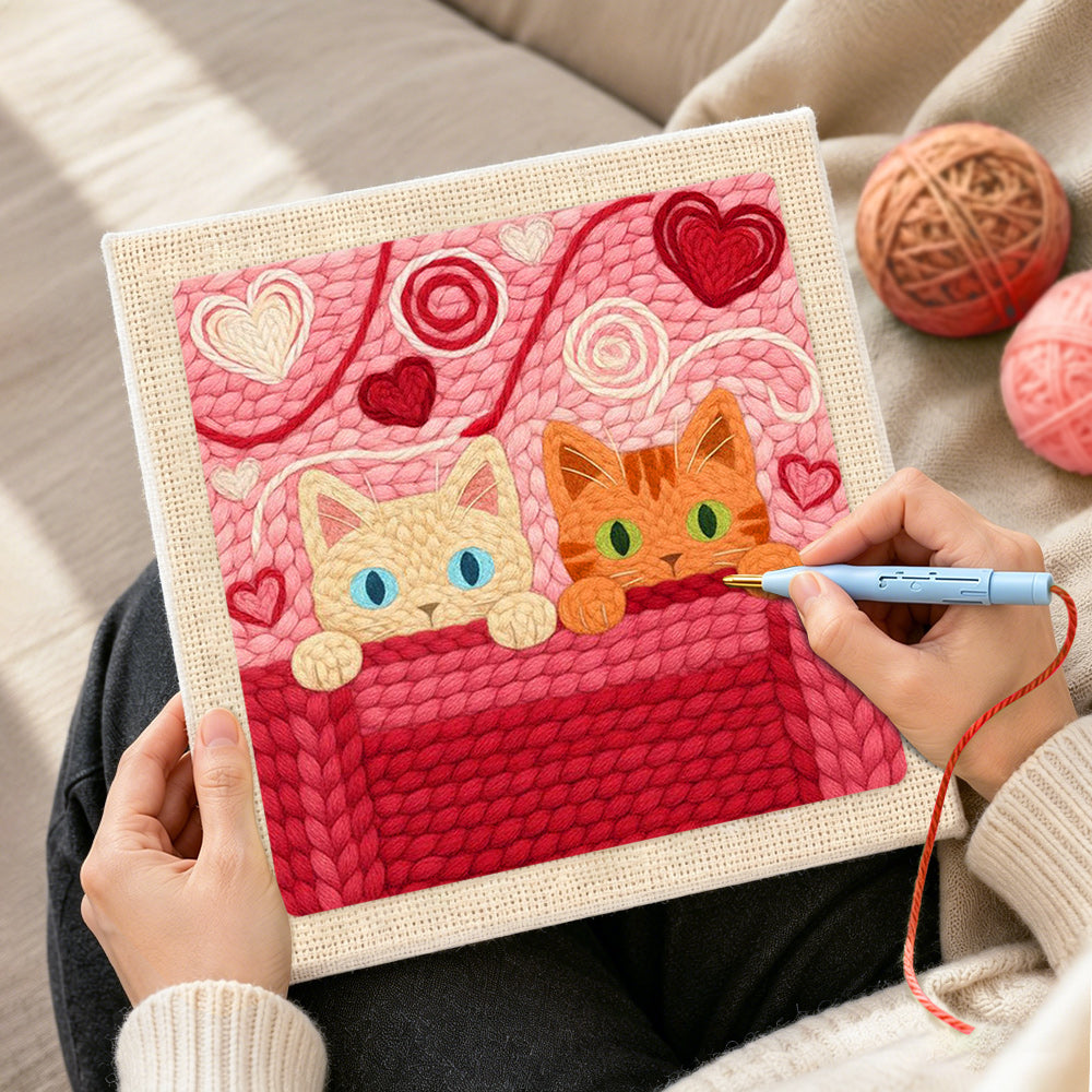 Creating handmade blue-eyed and green-eyed cats peeking punch needle artwork