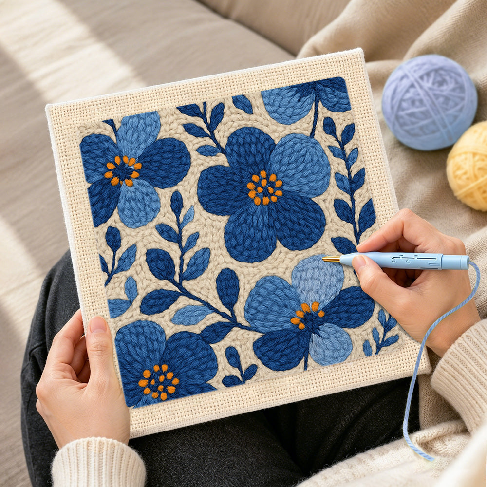 Creating handmade blue florals punch needle artwork