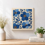 Finished blue florals artwork displayed on a wall