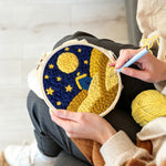 Creating handmade blue house on yellow hills under the starry sky punch needle artwork