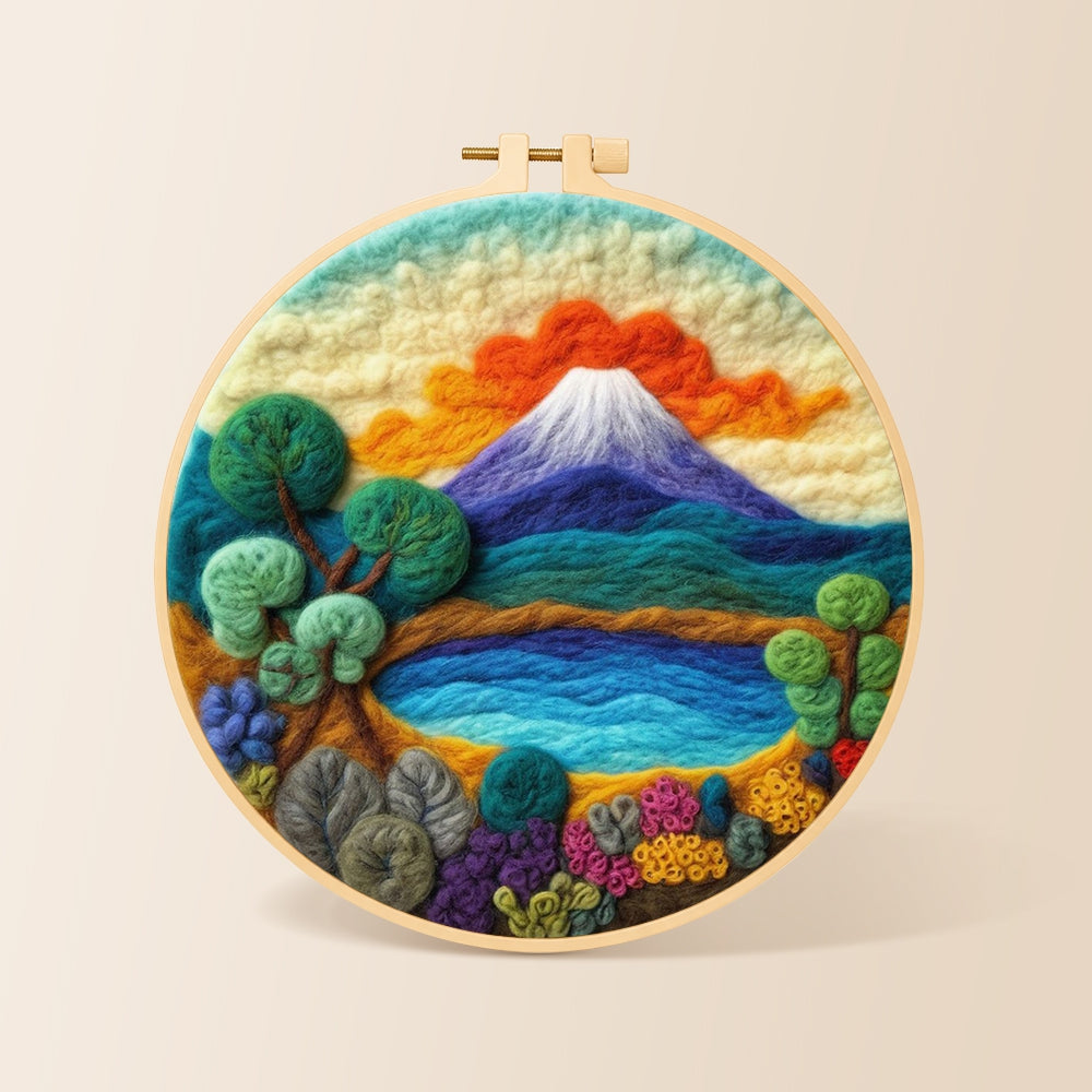 Blue lake, green trees and snow mountain needle felting kit for beginners with a round wooden frame