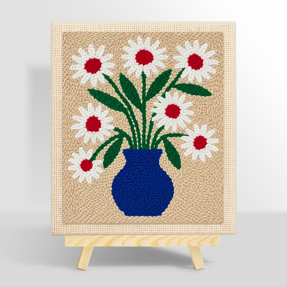 Blue vase with red-centred daisies punch needle kit for beginners