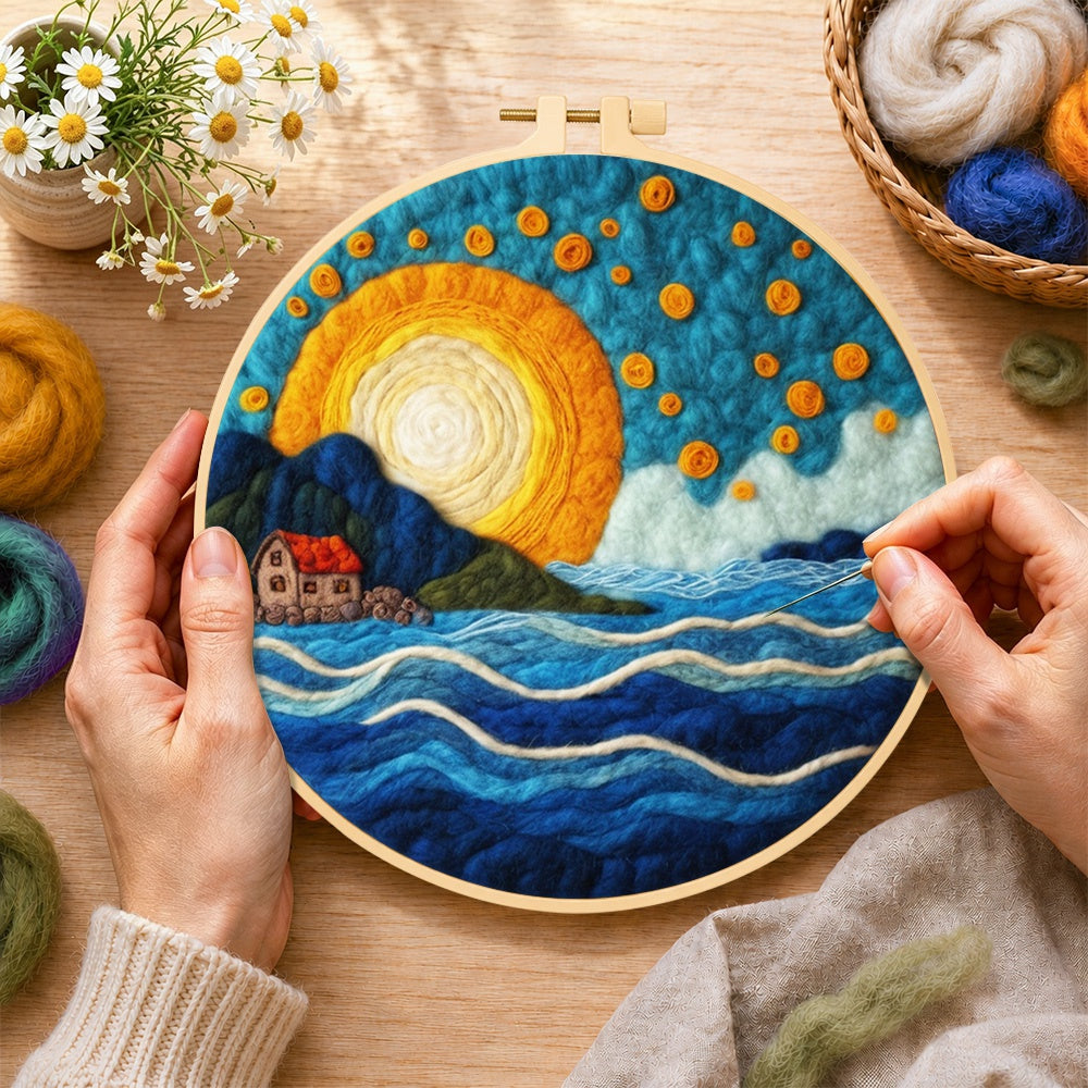 Creating the blue waves under the golden sunset wool painting by hand with a felting needle