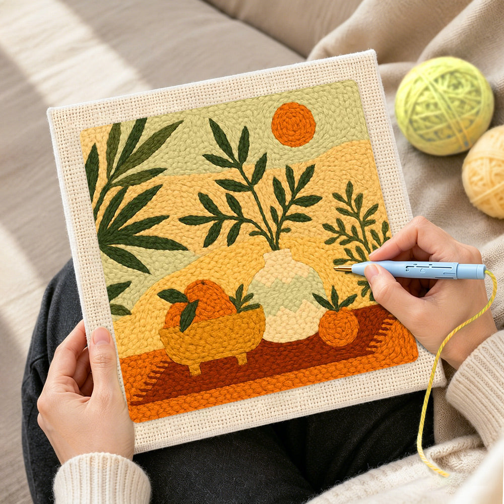 Creating handmade boho leaves, oranges and sun punch needle artwork