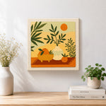 Finished boho leaves, oranges and sun artwork displayed on a wall