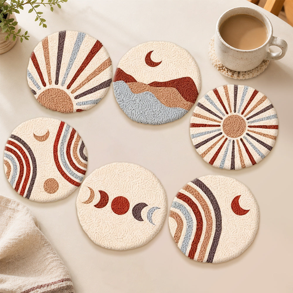 Boho sun, moon and mountain punch needle coasters used for home decoration