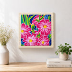 Finished bold pink tropical flowers artwork displayed on a wall