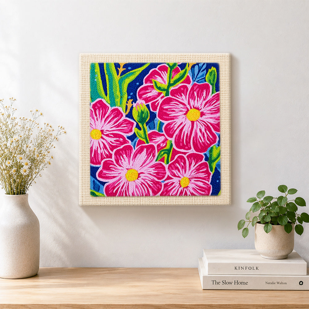 Finished bold pink tropical flowers artwork displayed on a wall