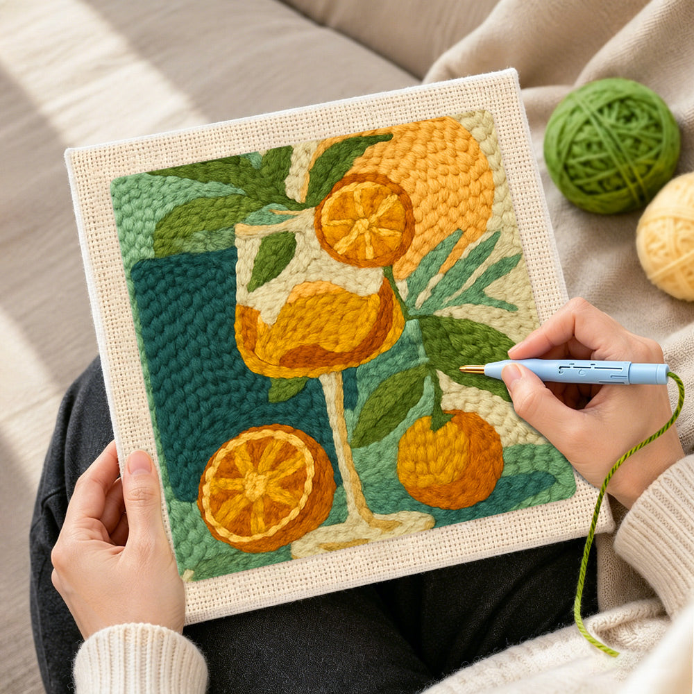 Creating handmade botanical citrus drink punch needle artwork