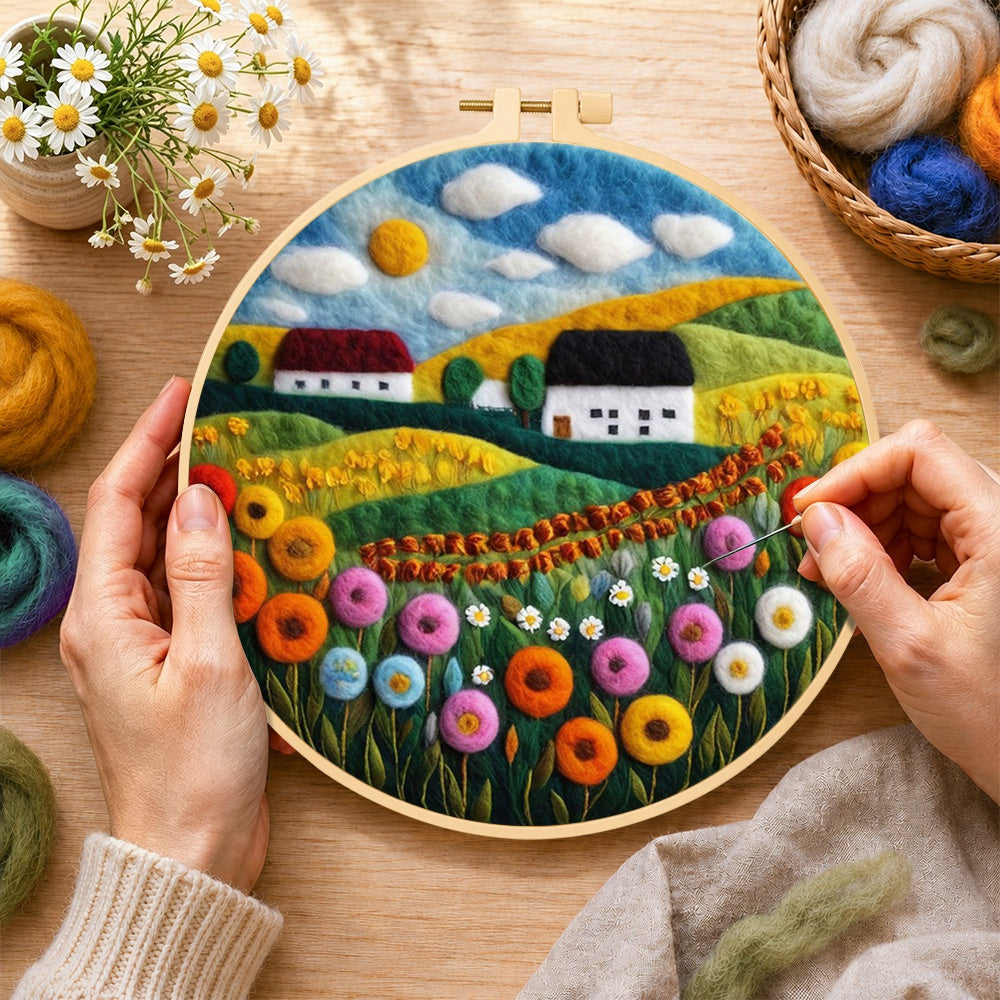Creating the bountiful wildflower field and summer cottage wool painting by hand with a felting needle