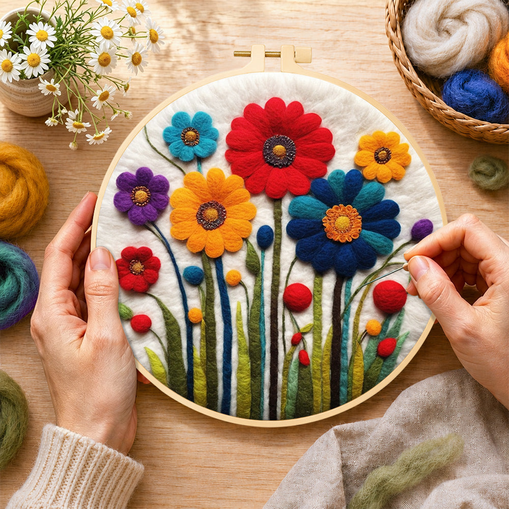 Creating the bright and cheerful wildflowers wool painting by hand with a felting needle