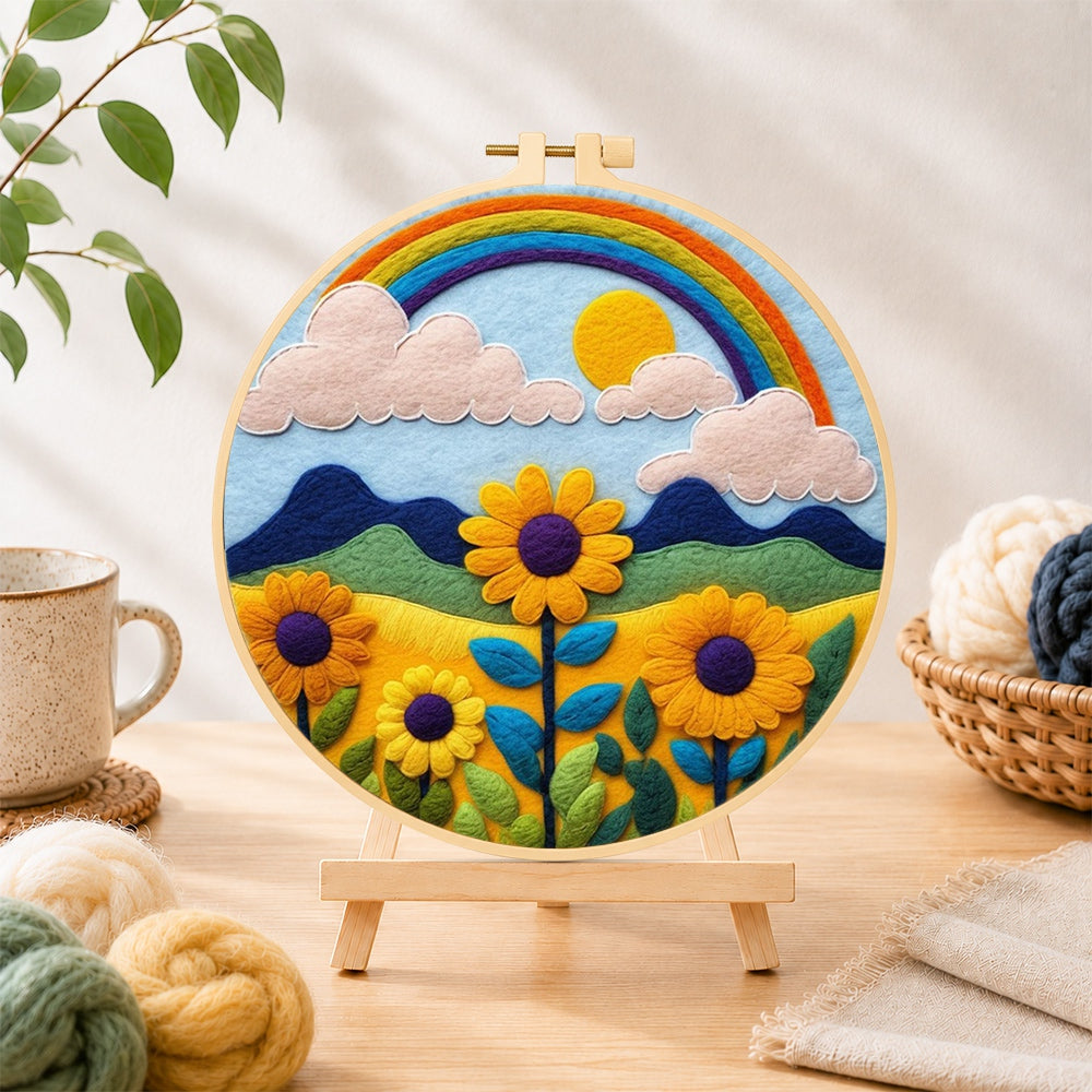 Finished bright sunflower and rainbow needle felting displayed on a wooden easel