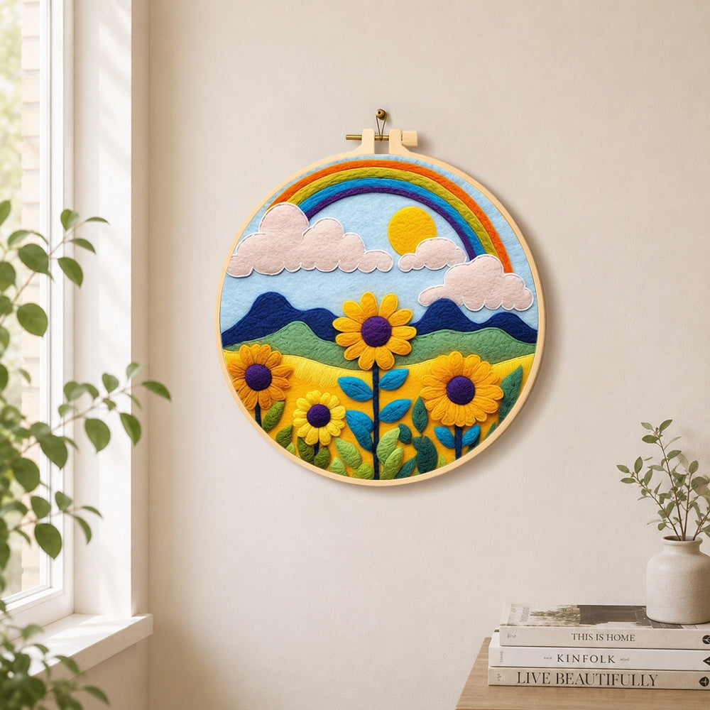 Bright sunflower and rainbow needle felt wall art displayed in a bright home interior
