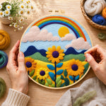 Creating the bright sunflower and rainbow wool painting by hand with a felting needle