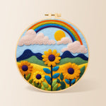 Bright sunflower and rainbow needle felting kit for beginners with a round wooden frame