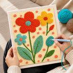 Creating handmade bright tricolour flowers punch needle artwork