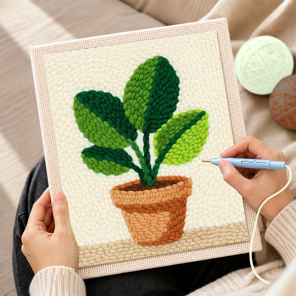 Creating handmade broad leaf potted plant punch needle artwork