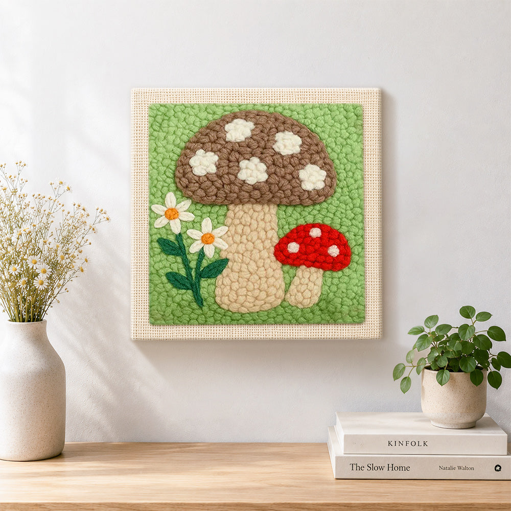 Finished brown and red mushrooms artwork displayed on a wall