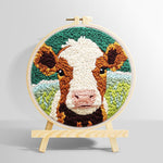 Brown and white cow face punch needle kit for beginners