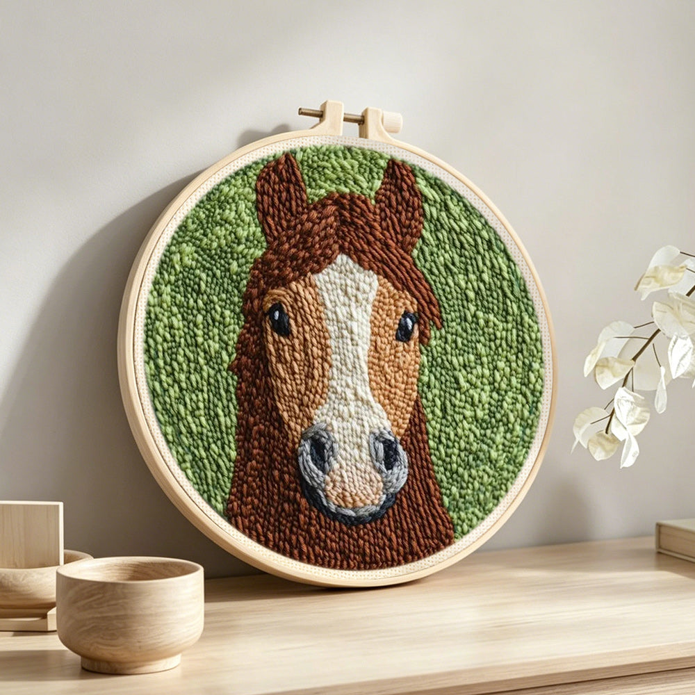 Brown horse punch needle artwork displayed on a table