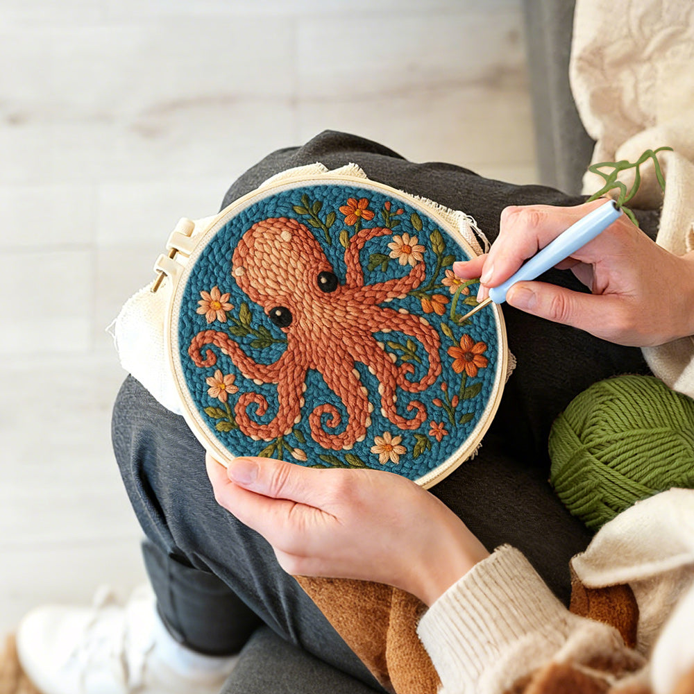 Creating handmade brown octopus and flowers punch needle artwork