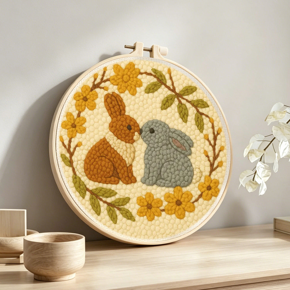 Bunny love wreath punch needle artwork displayed on a table