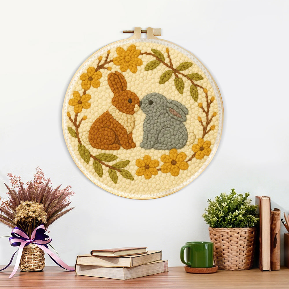 Finished bunny love wreath artwork displayed on a wall