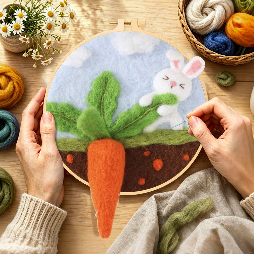 Creating the bunny pulling a giant carrot wool painting by hand with a felting needle