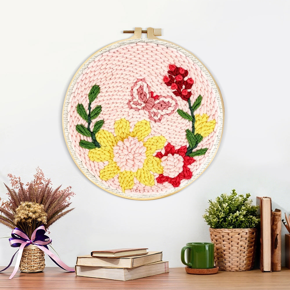 Finished butterfly and blooming flowers artwork displayed on a wall