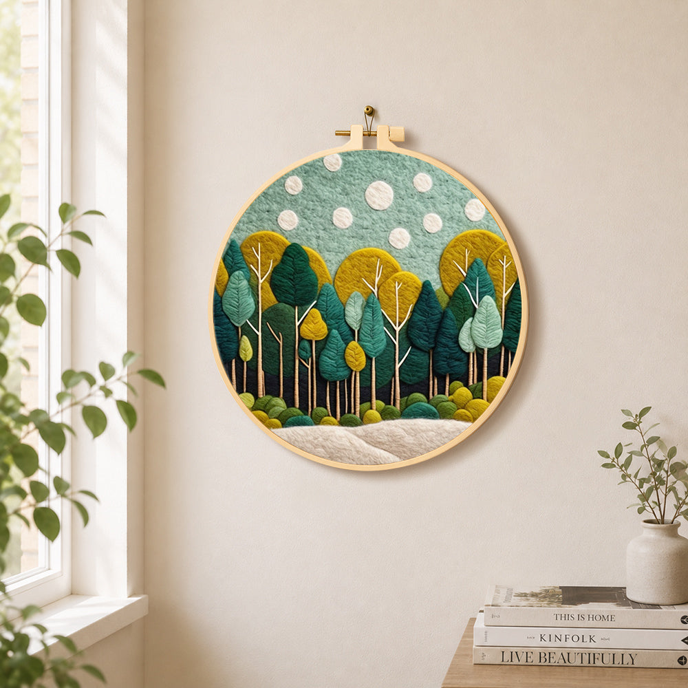 Calming green forest needle felt wall art displayed in a bright home interior