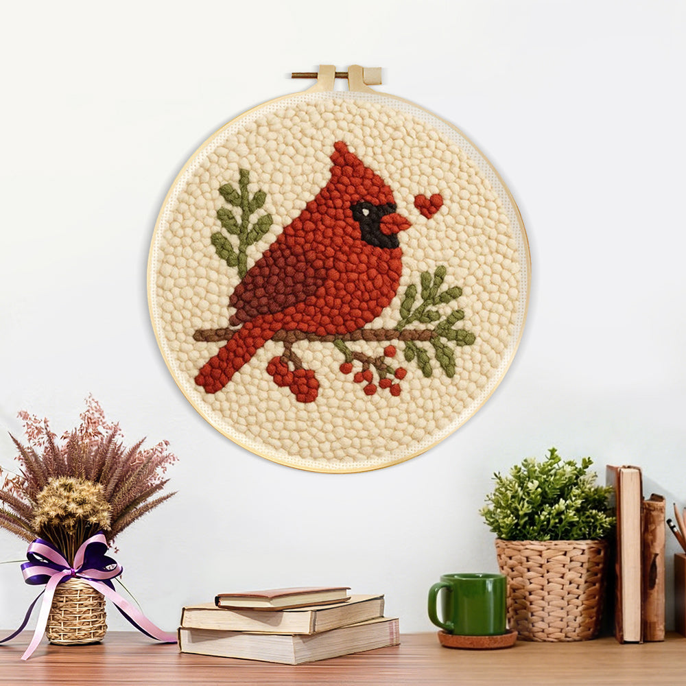 Finished cardinal and berries artwork displayed on a wall