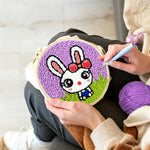 Creating handmade cartoon rabbit on the grass punch needle artwork