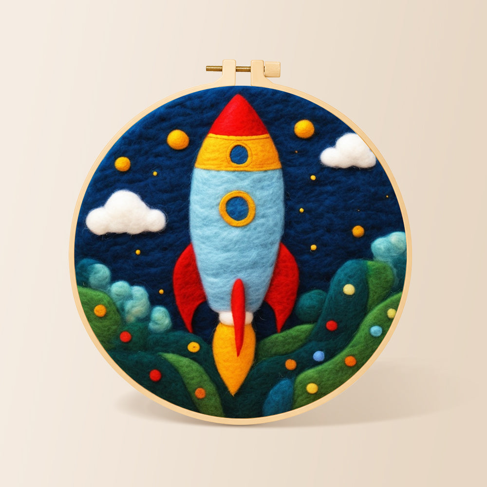 Cartoon rocket launch needle felting kit for beginners with a round wooden frame