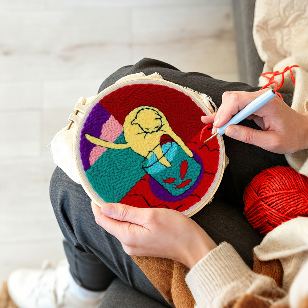 Creating handmade cat and fish tank punch needle artwork