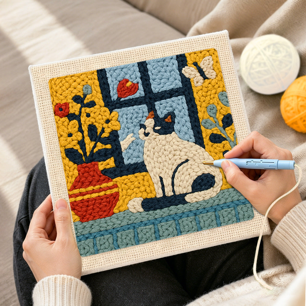 Creating handmade cat and flower vase on windowsill punch needle artwork