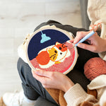 Creating handmade cat under the chandelier punch needle artwork