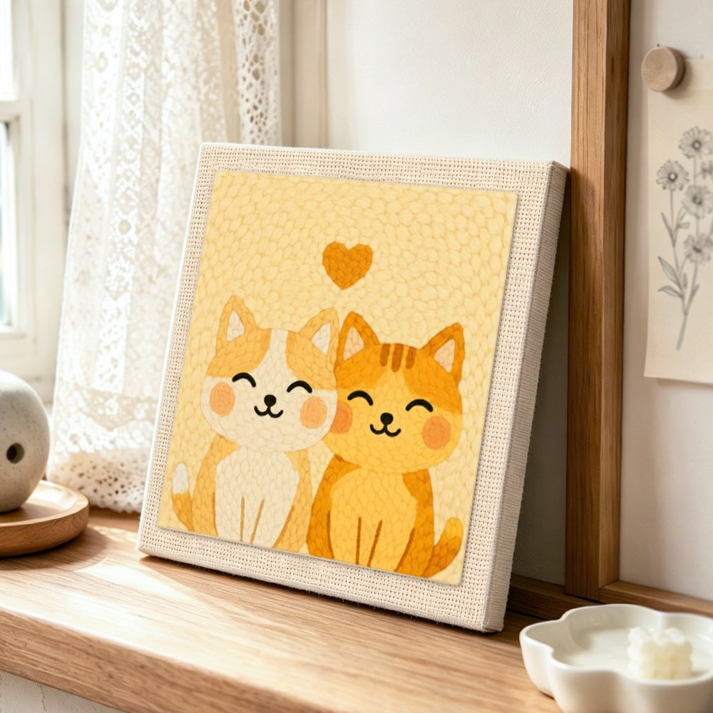Cat's best friend punch needle artwork displayed on a table