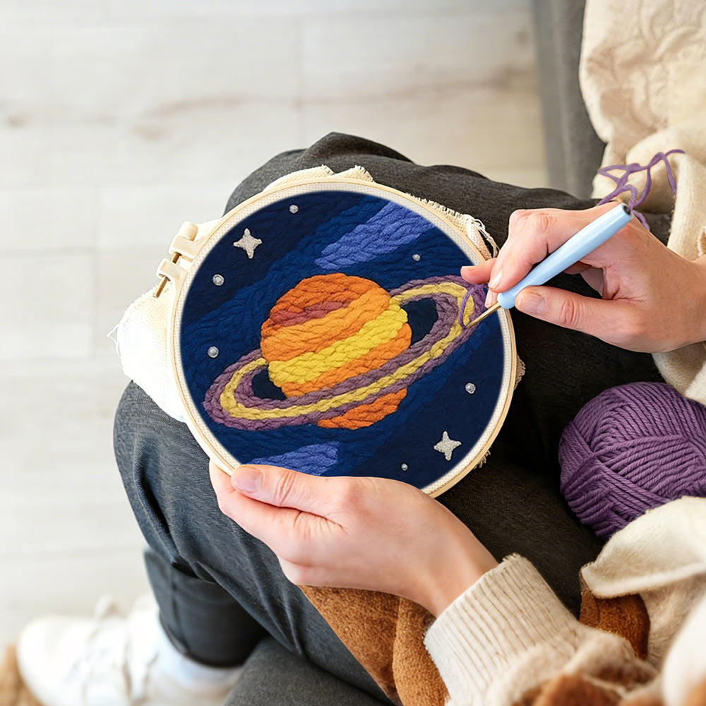 Creating handmade celestial saturn punch needle artwork