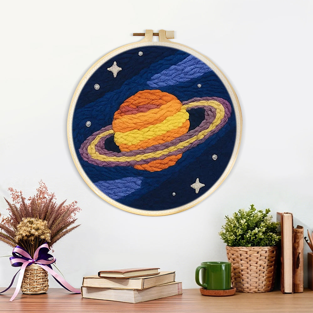 Finished celestial saturn artwork displayed on a wall