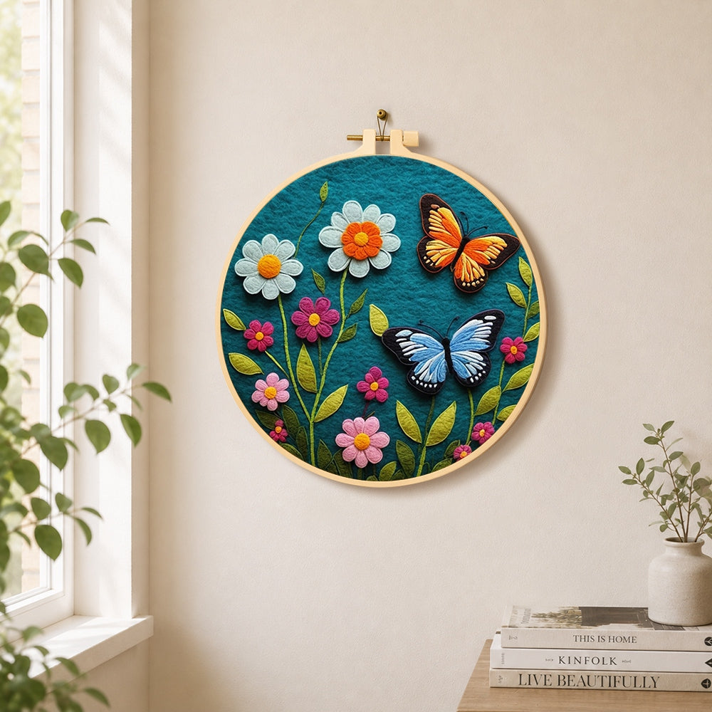 Charming butterfly and daisy needle felt wall art displayed in a bright home interior