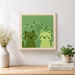 Finished charming green cat couple artwork displayed on a wall