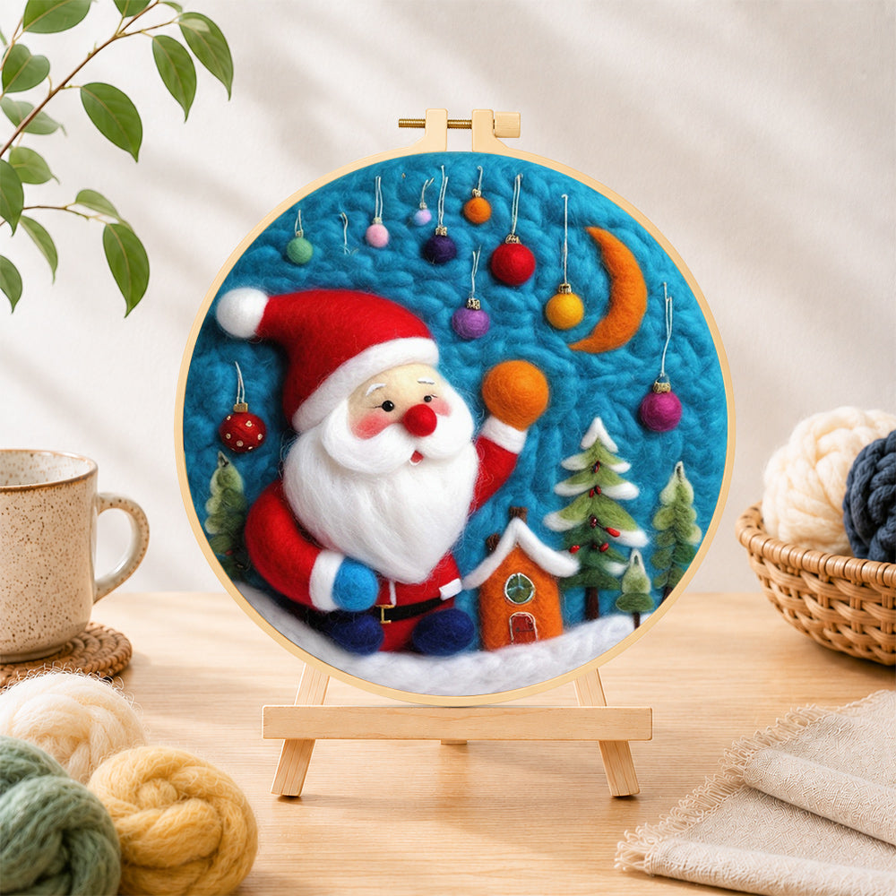 Finished charming santa with hanging baubles needle felting displayed on a wooden easel