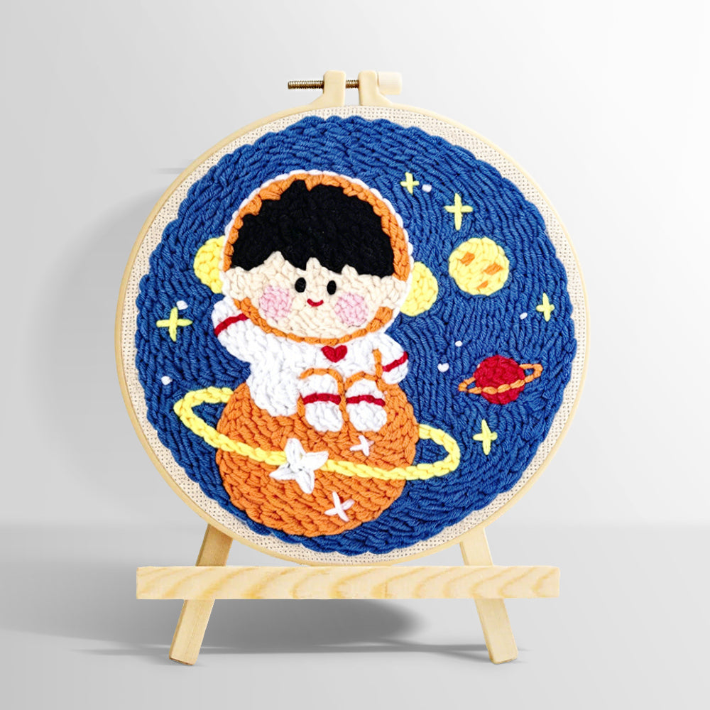 Charming space boy on orange planet punch needle kit for beginners