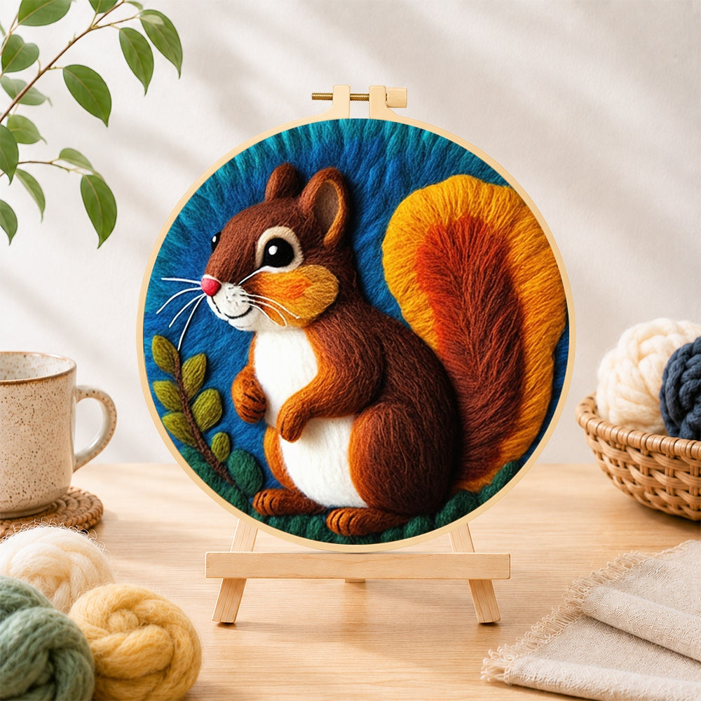 Finished charming squirrel with fluffy tail needle felting displayed on a wooden easel