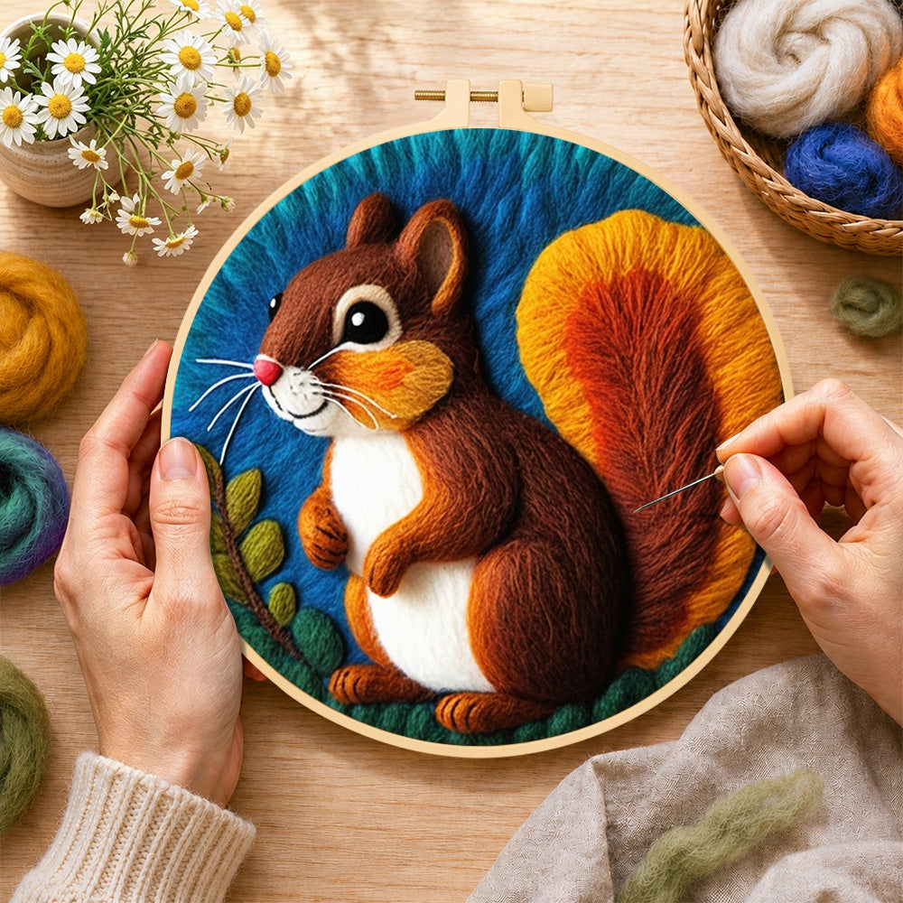 Creating the charming squirrel with fluffy tail wool painting by hand with a felting needle