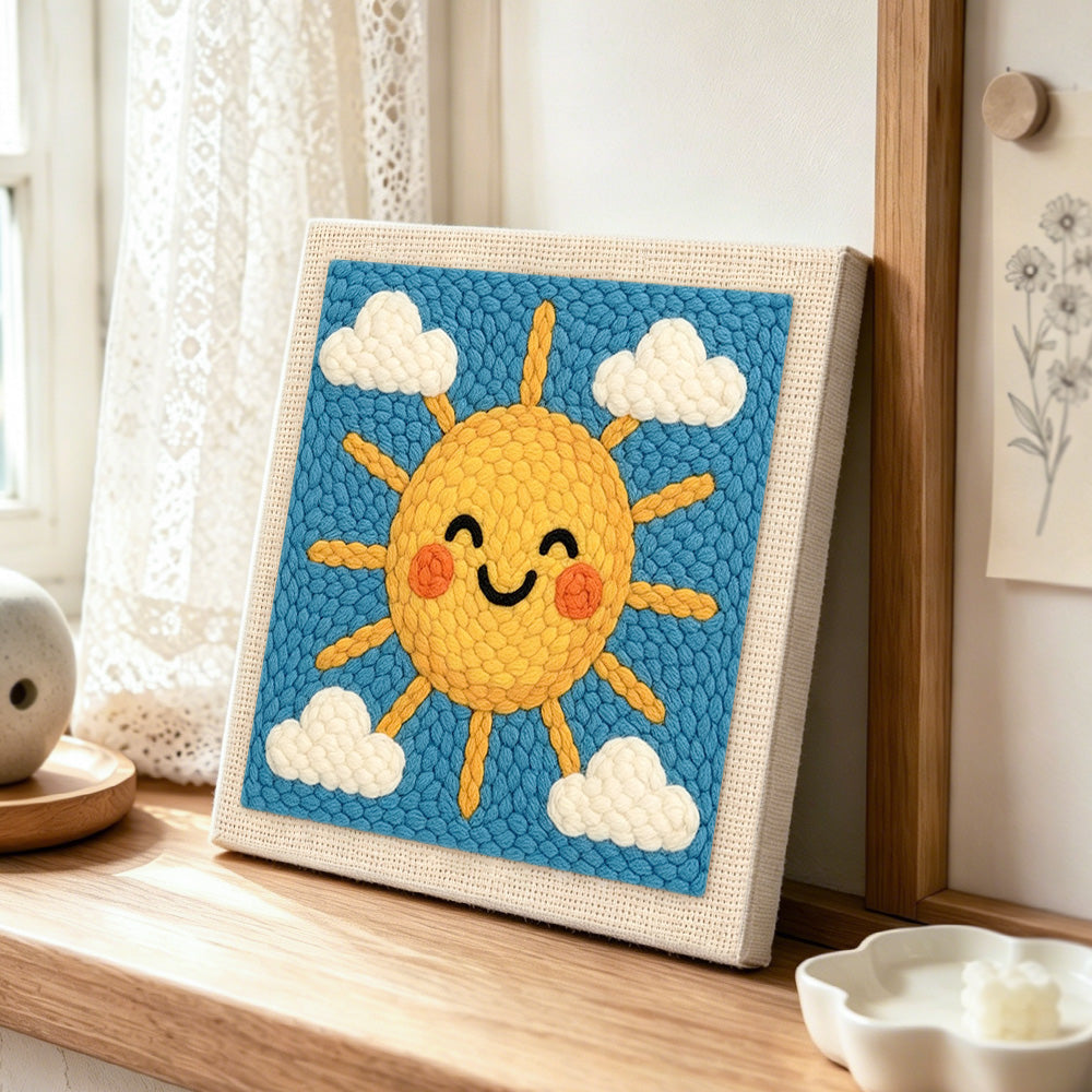 Cheerful smiley sun punch needle artwork displayed on a table