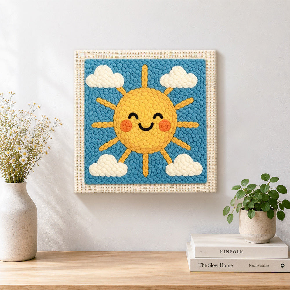 Finished cheerful smiley sun artwork displayed on a wall